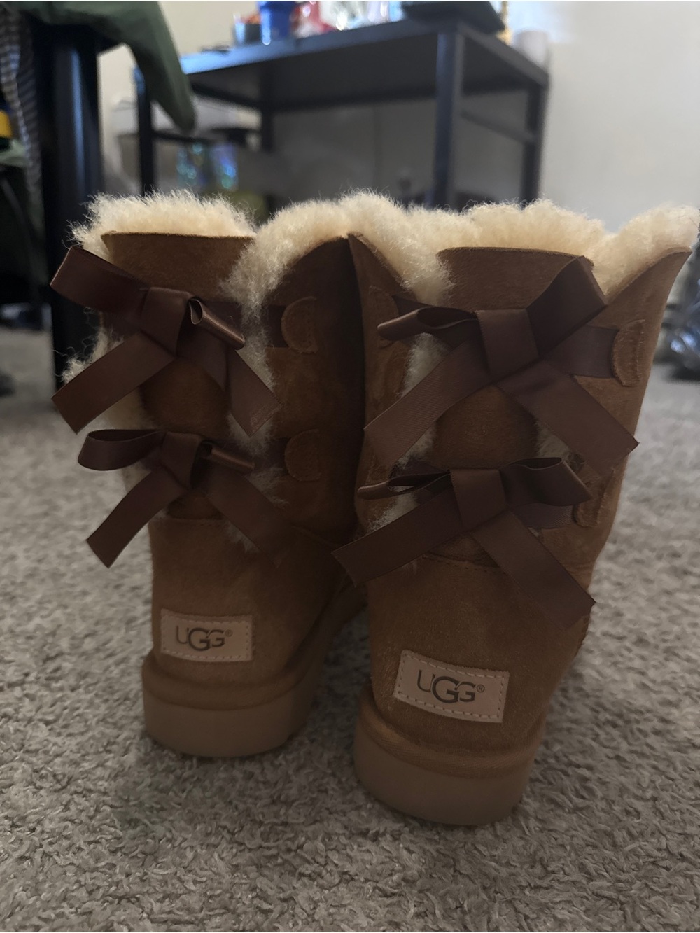 UGG Women’s Short Suede Shearling Boots with Back Ribbon Bows - Chestnut Brown